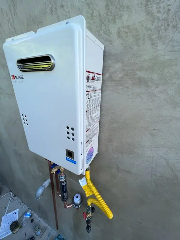Tankless water heater installation for Brownlee homes